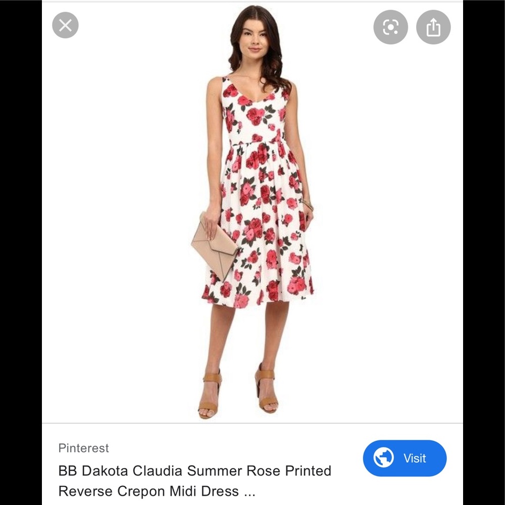 White and red sleeveless midi dress with roses
